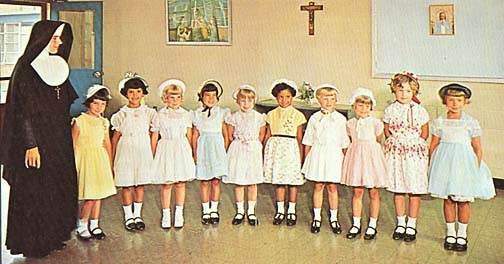 Girls line up for inspection before going to chapel at St. Joseph's Village